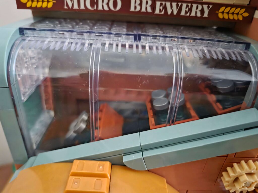 Close up of the boxed bottles on the conveyor belt on the Pantasy Craft Brewery 85023