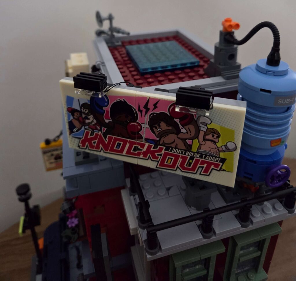 Printed graffiti and signage pieces in the Lumibricks Boxing Club 19009