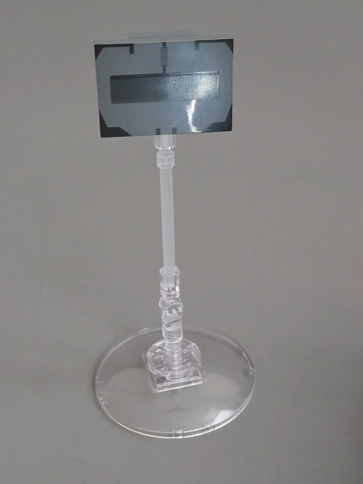 K's Spinner detachable rooftop drone mounted on its transparent display stand