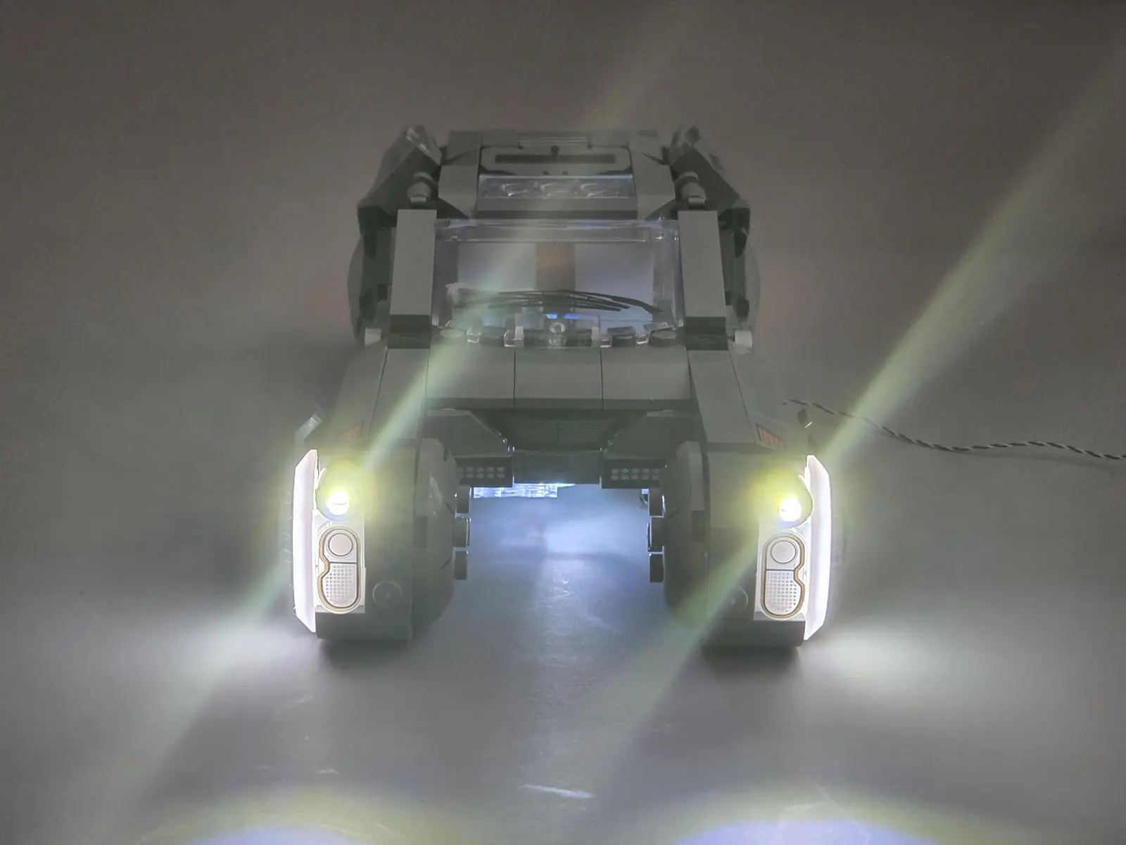 Front view of K's Spinner with the bright white wheel arch lights switched on