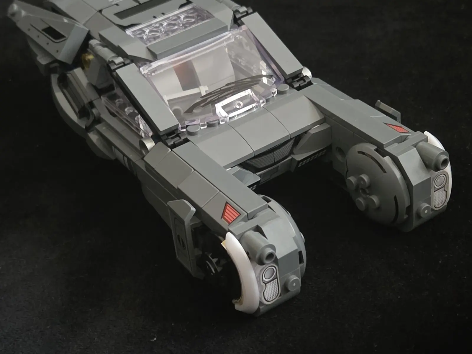 Front three-quarter view of the Lumibricks K's Spinner 23001 showing its twin front pods and cockpit