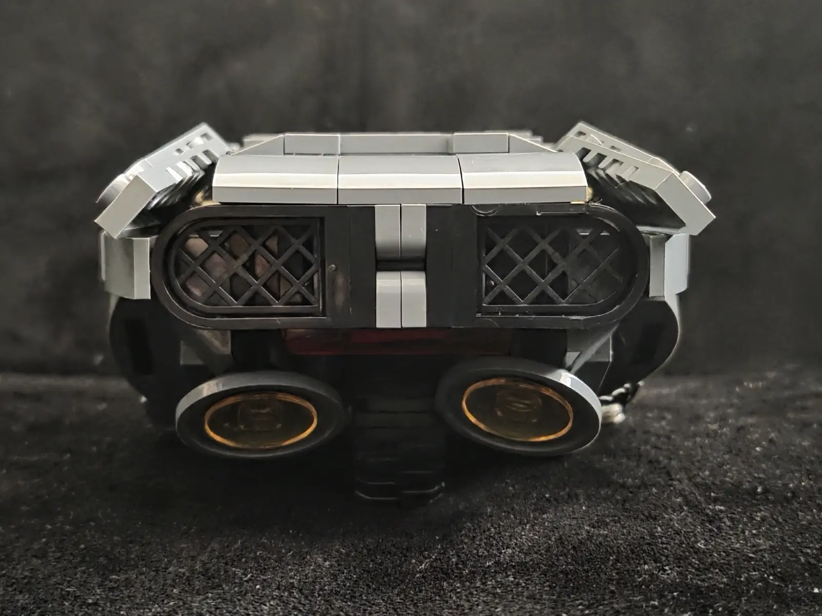Rear profile of the Lumibricks K's Spinner 23001 showing its wide body and twin rear details