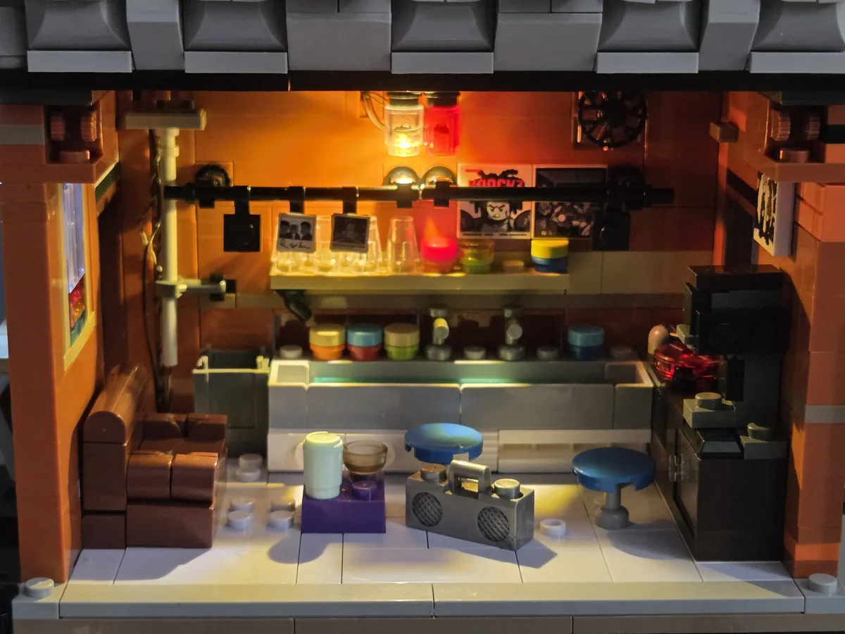 The detailed upper-floor darkroom under its normal warm light