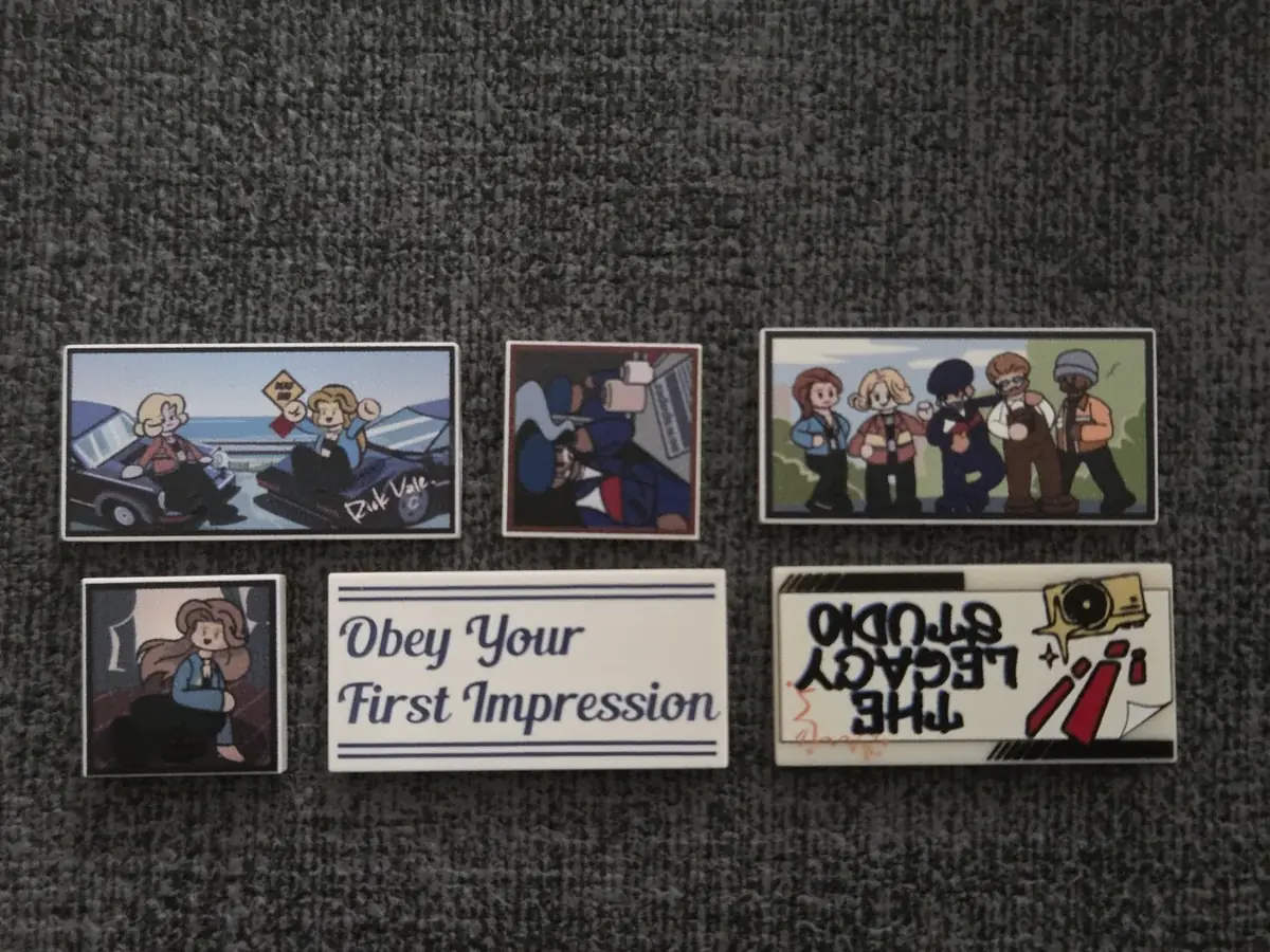 A selection of printed photographs and signs included with Corner Photo Studio 19016