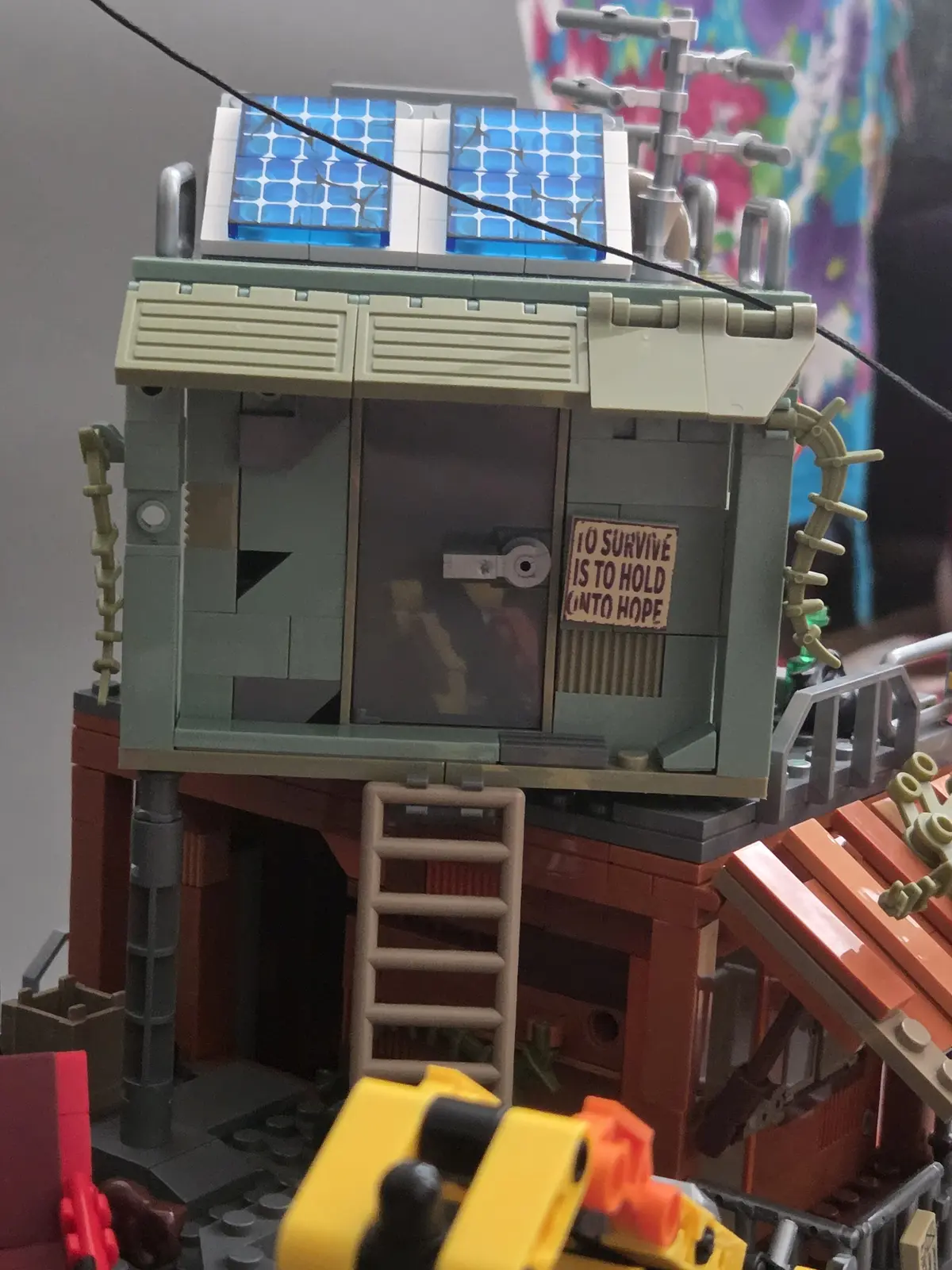 Angled green upper shack on the IAMBRICK Doomsday Gas Station above the workshop