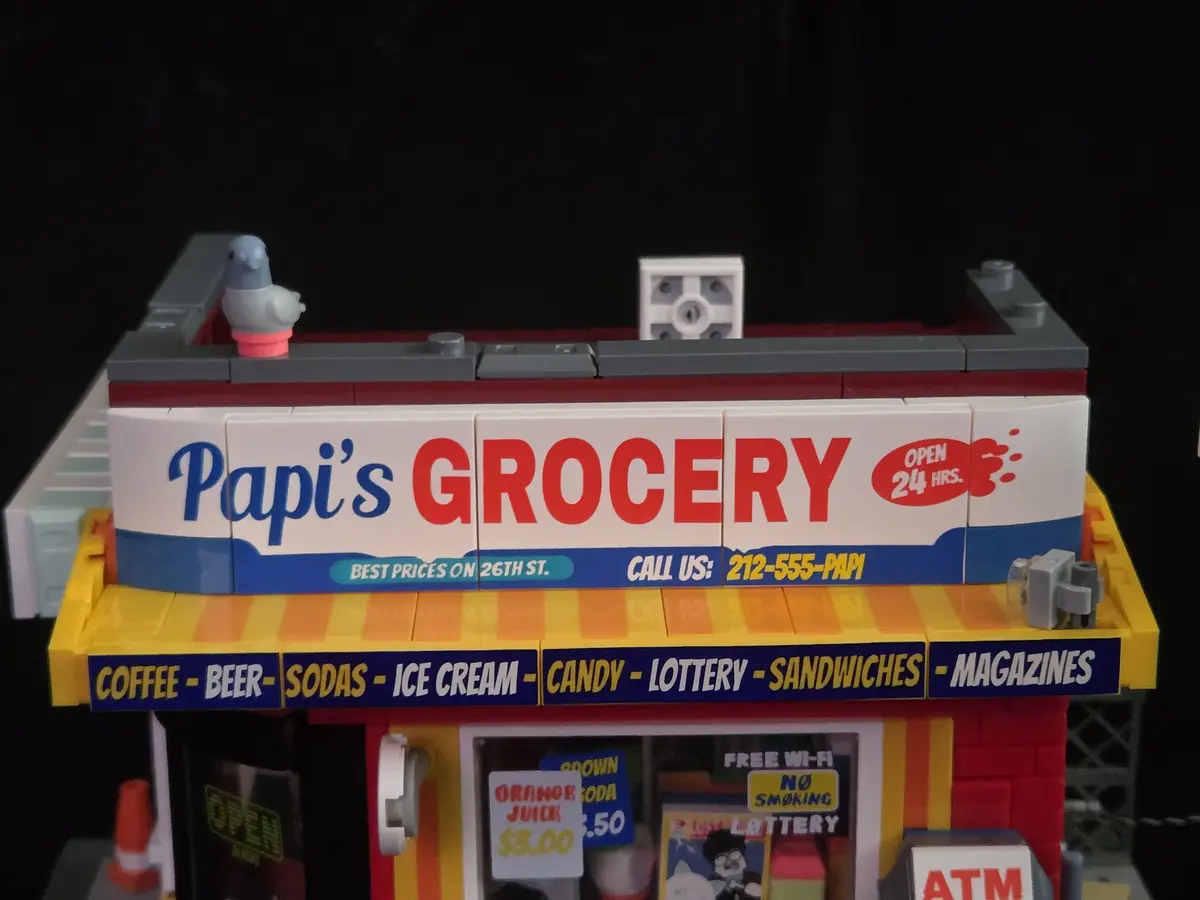 Large printed Papi's Grocery sign on Lumibricks The Bodega 26 19017