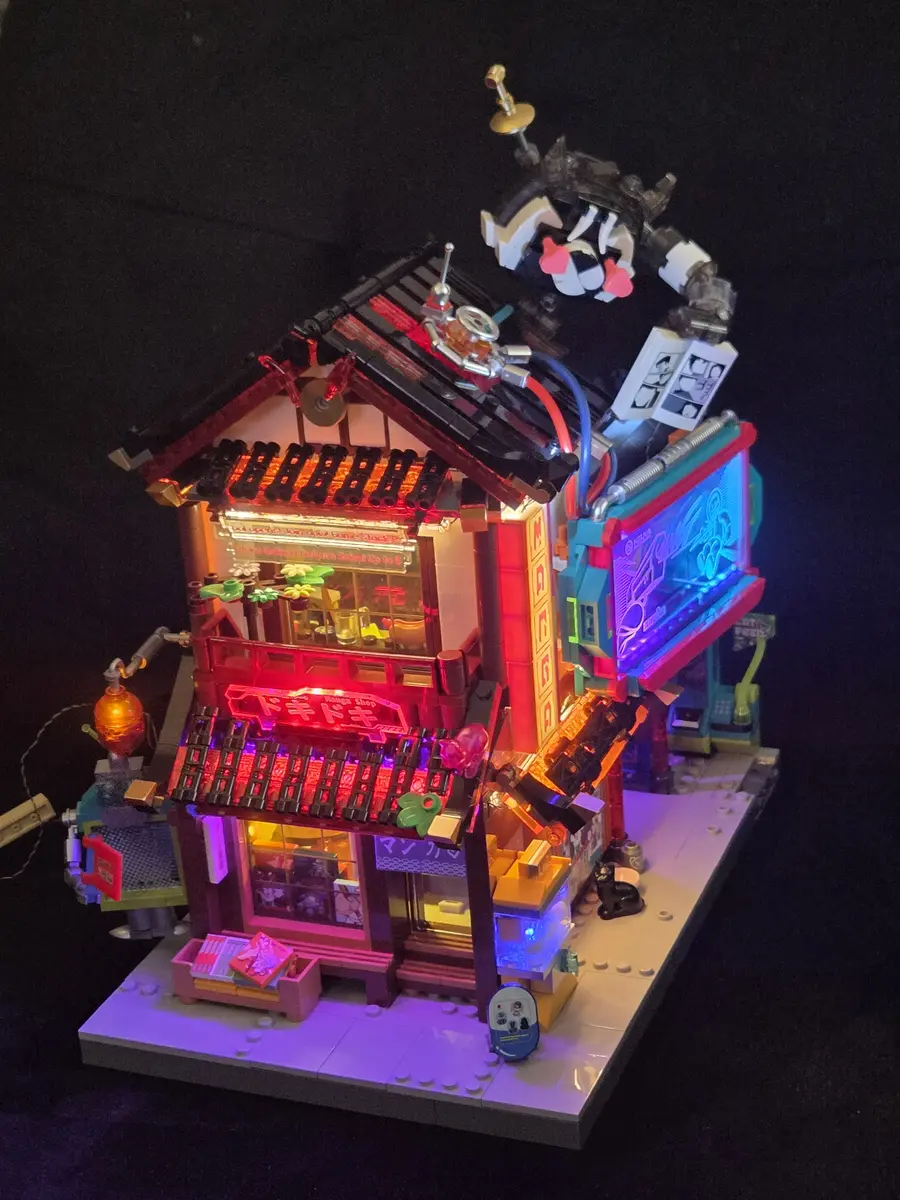 Completed Lumibricks Manga Shop 17015 illuminated at night