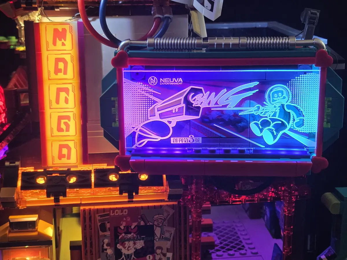 Manga Shop layered billboard illuminated with edge lighting