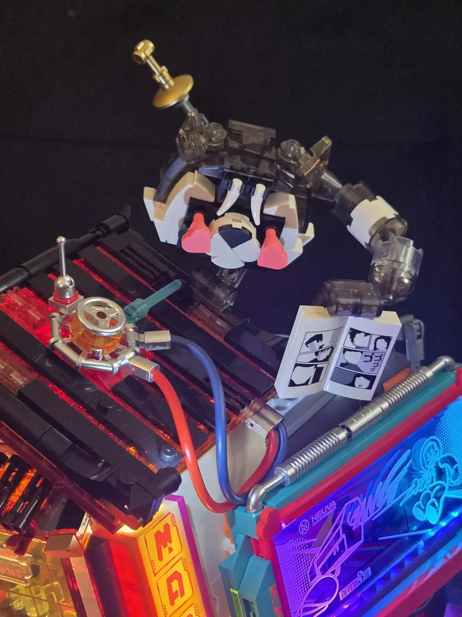 Illuminated rooftop tanuki, machinery and transparent roof sections