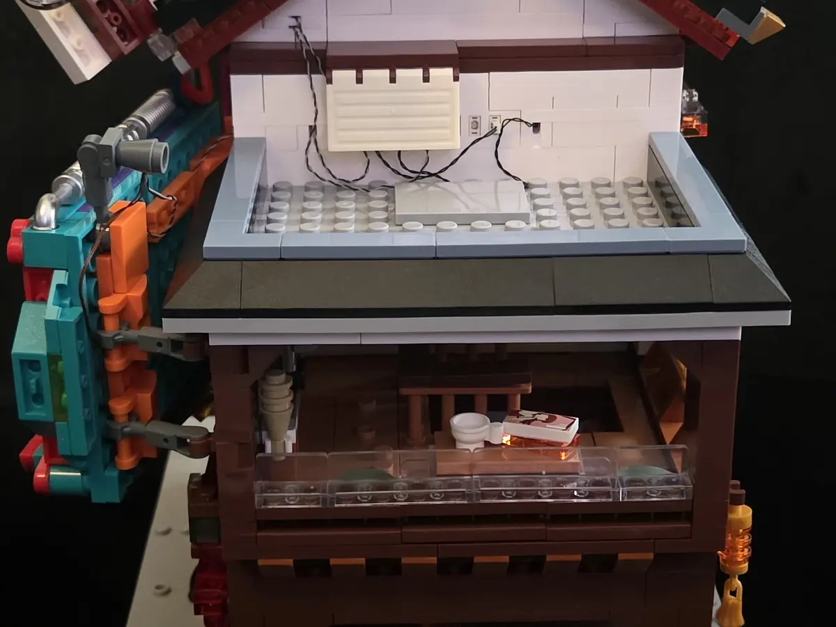Open side roof showing the lighting expansion board and wiring