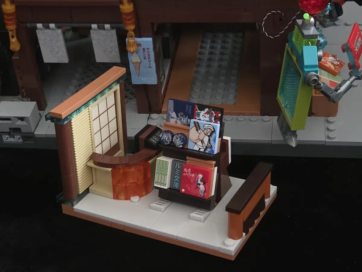 Slide-out browsing room with printed manga covers and counter