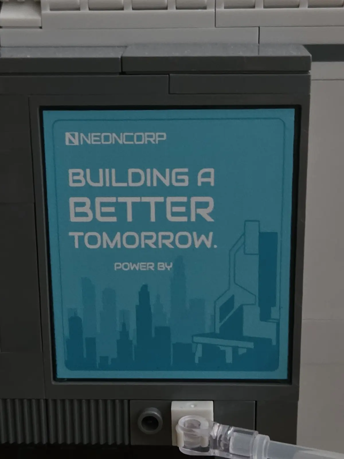 Building a Better Tomorrow Neoncorp advert on the Tech Tower 17011