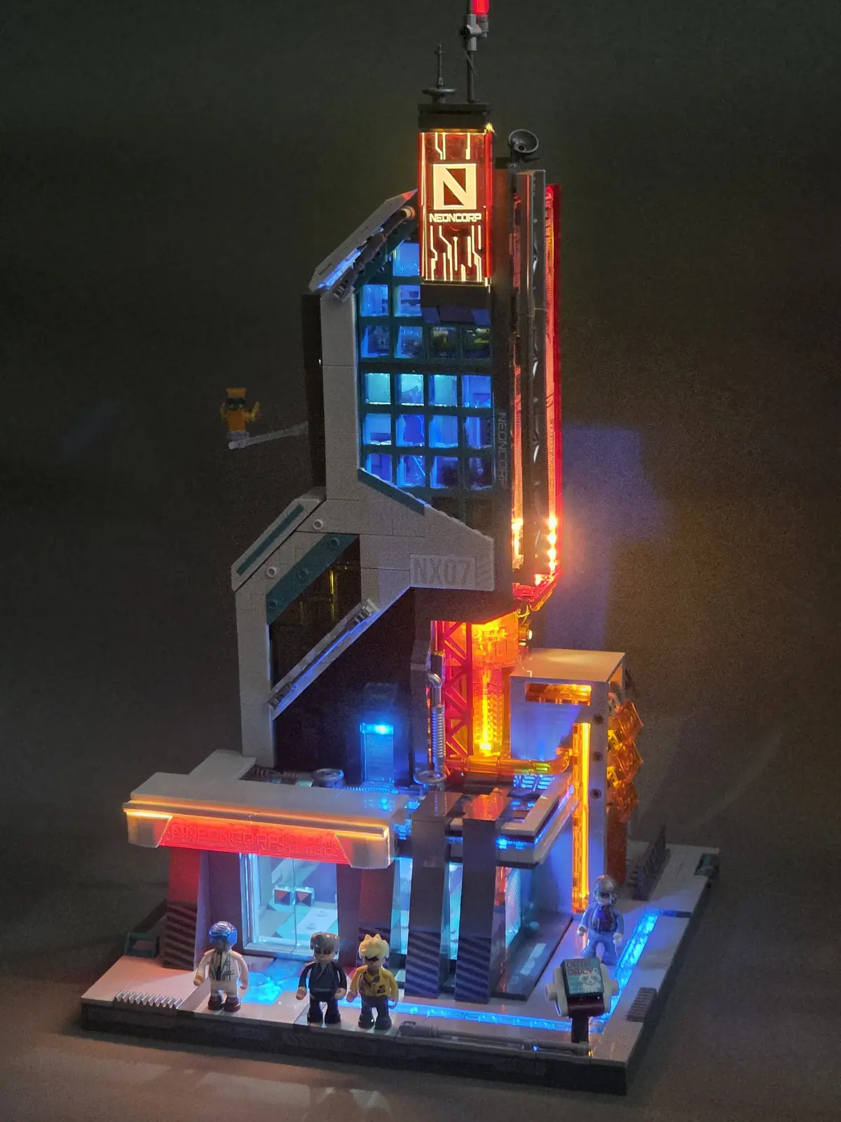 Lumibricks Neon Tech Tower 17011 fully illuminated from the front