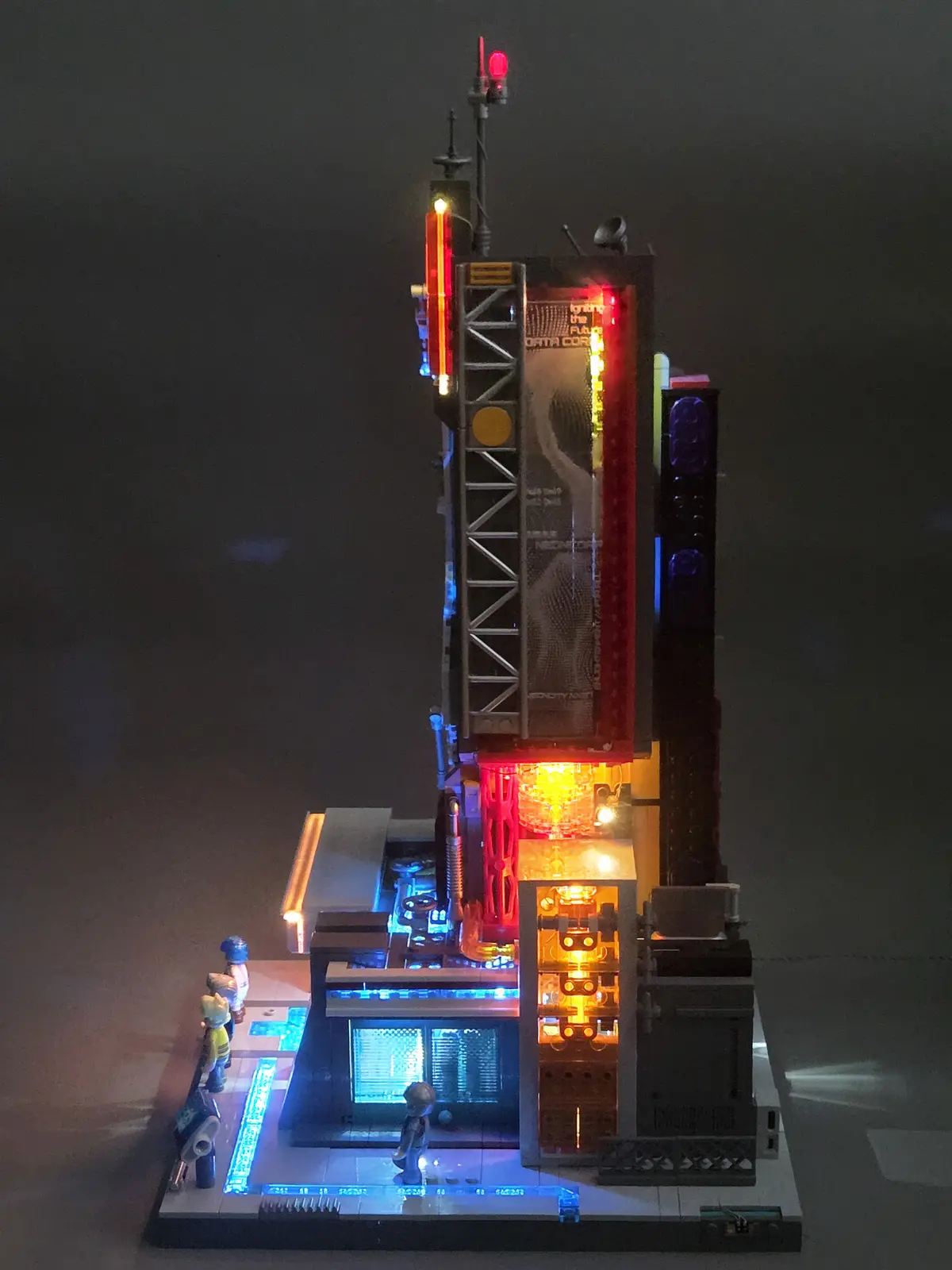 Lumibricks Neon Tech Tower 17011 illuminated from the side and rear