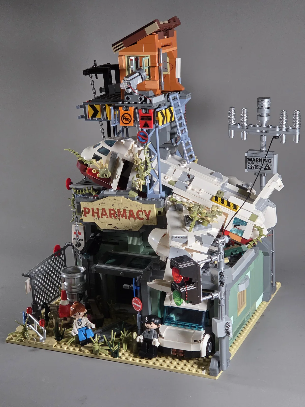 IAMBRICK Wrecked Plane Pharmacy 30902 completed model with crashed aircraft, watchtower and ambulance
