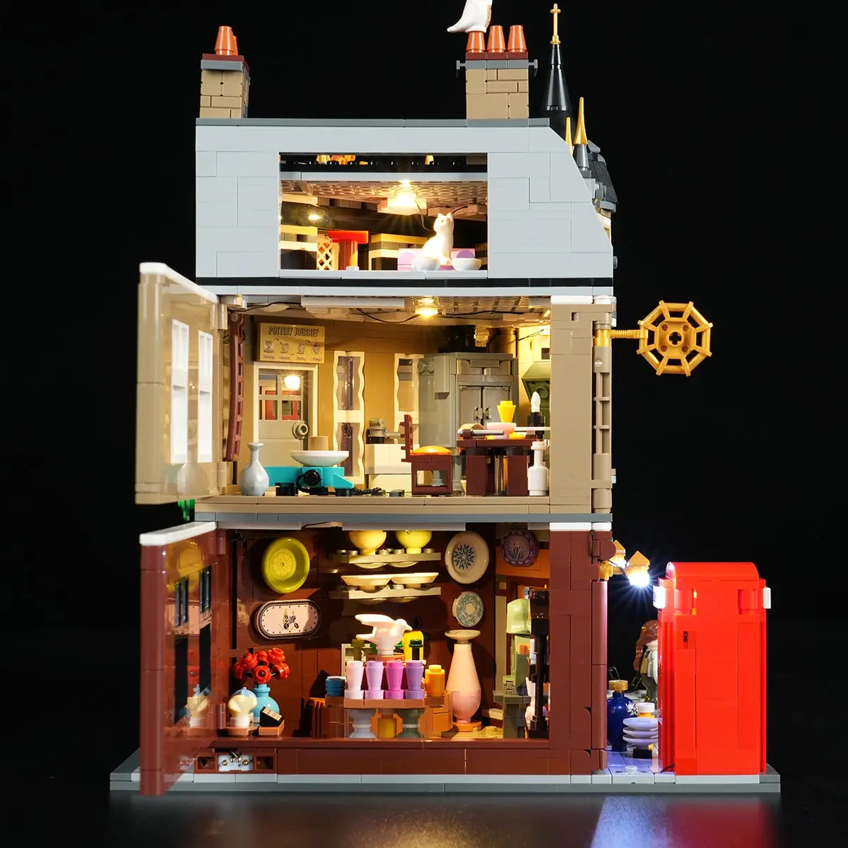 Open rear of the Edinburgh Corner pottery shop, showing the shop floor, workshop and cat loft
